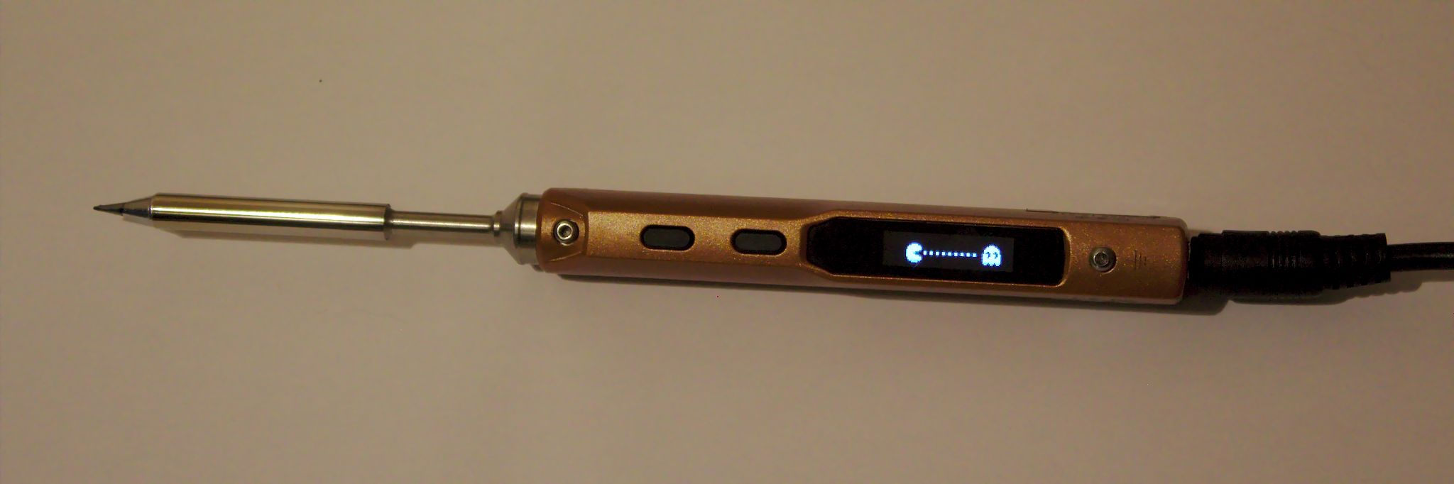 The TS100 soldering iron with pacman logo